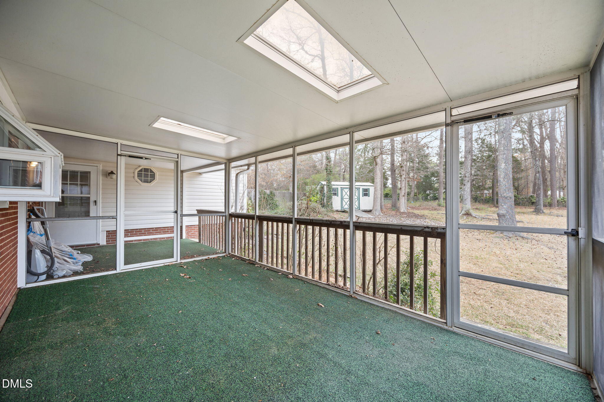 637 Buck Jones Road Raleigh, NC 27606 - Photo 24 of 32 a view of an empty room with a window and an outdoor view