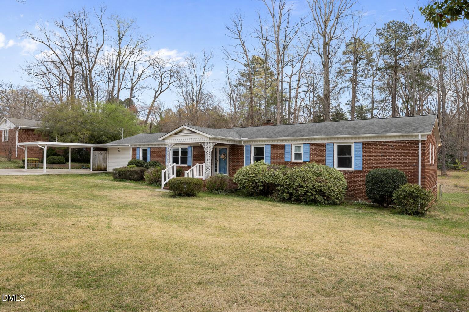 637 Buck Jones Road Raleigh, NC 27606 - Photo 25 of 32 a front view of a house with garden