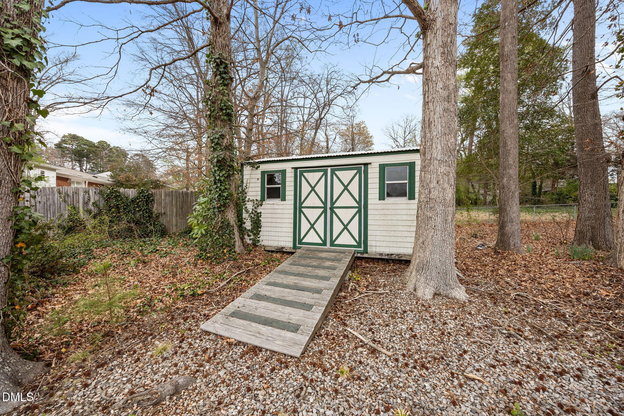 637 Buck Jones Road Raleigh, NC 27606 - Photo 26 of 32 a front view of a house with garden
