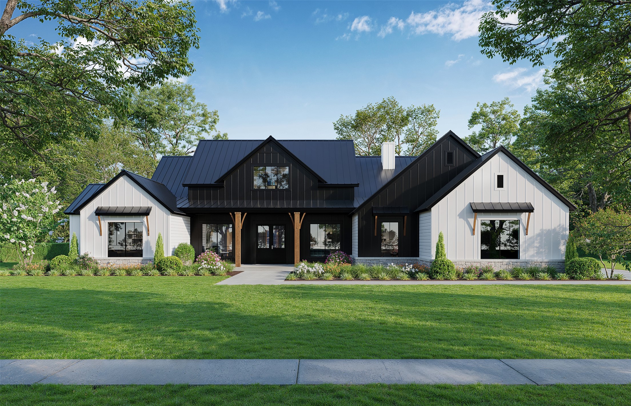 1117 Mountain Pond Road Georgetown, TX 78633 - Photo 2 of 8 Modern farmhouse design combines with a spacious front lawn and welcoming porch under a dramatic black metal roof.