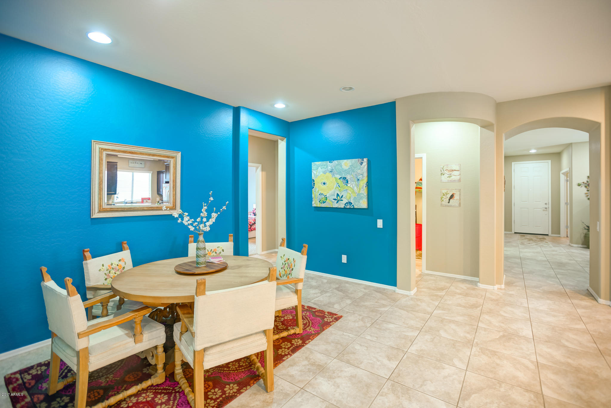 3515 East Ivanhoe Street Gilbert, AZ 85295 - Photo 11 of 49 a dining room with furniture and a chandelier
