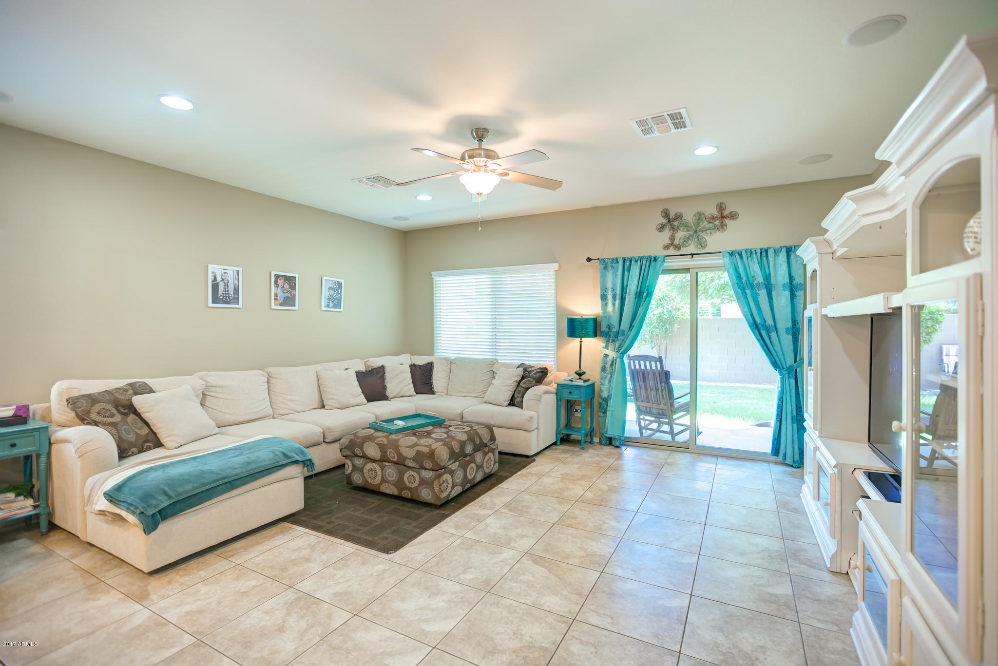 3515 East Ivanhoe Street Gilbert, AZ 85295 - Photo 13 of 49 a living room with furniture and a large window