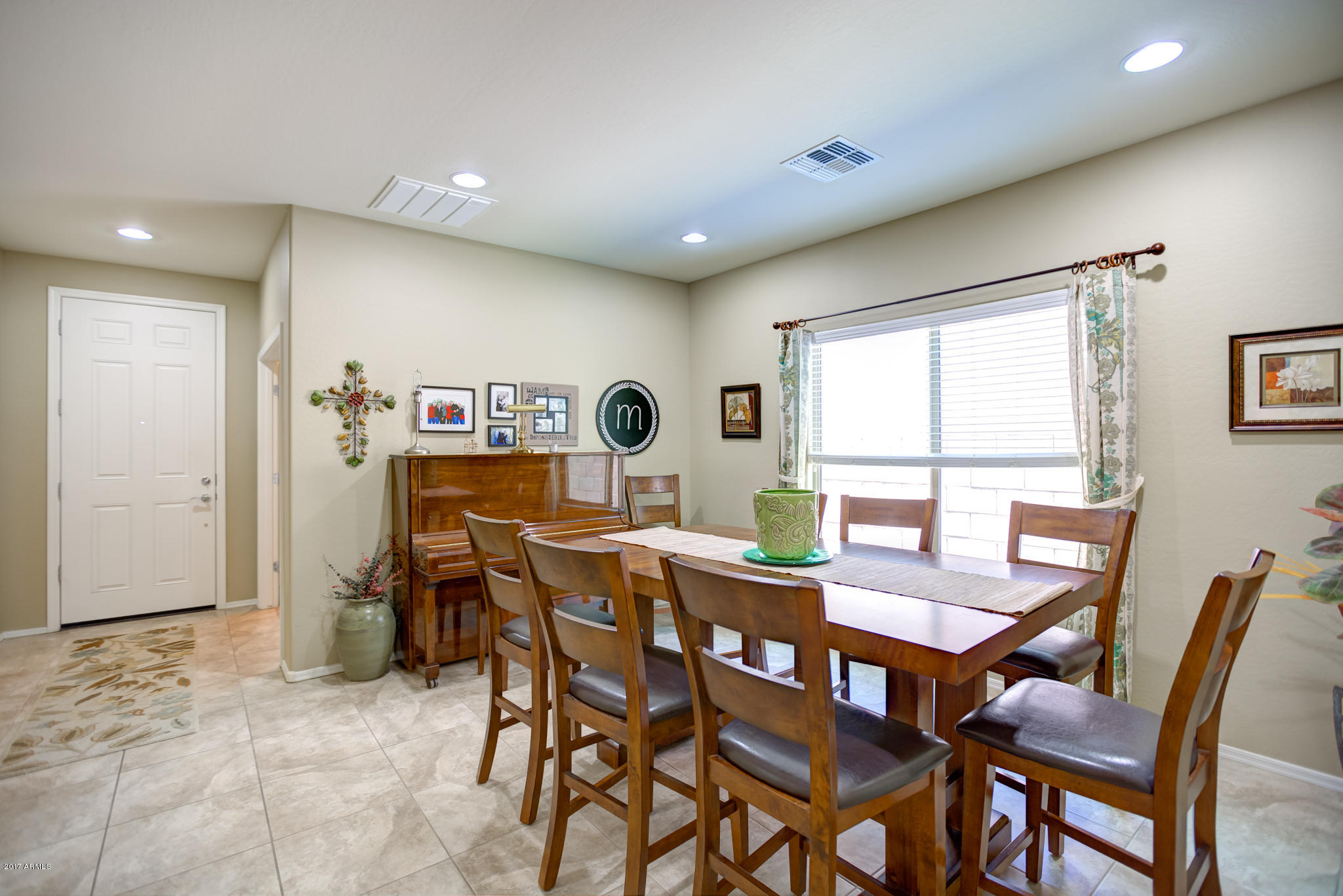 3515 East Ivanhoe Street Gilbert, AZ 85295 - Photo 16 of 49 a view of a dining room with furniture