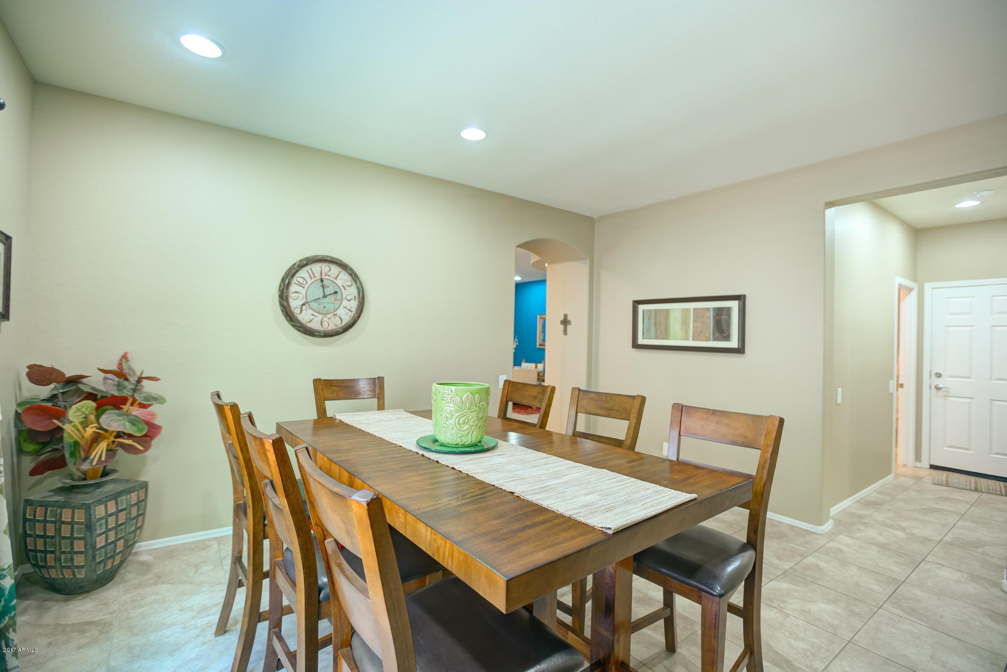 3515 East Ivanhoe Street Gilbert, AZ 85295 - Photo 17 of 49 a view of a dining room with furniture and a table