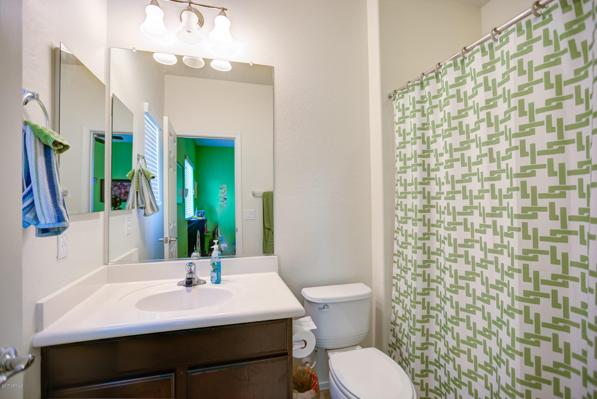 3515 East Ivanhoe Street Gilbert, AZ 85295 - Photo 28 of 49 a bathroom with a sink and a mirror