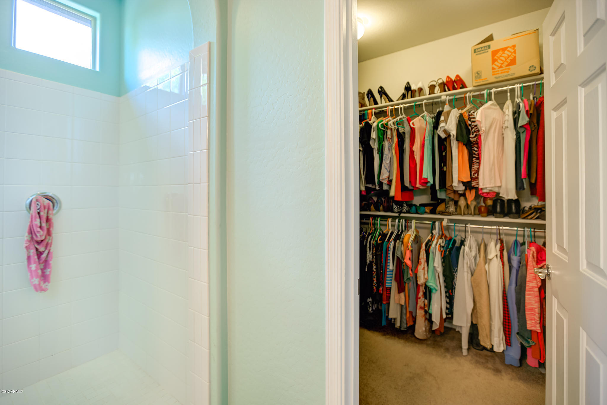 3515 East Ivanhoe Street Gilbert, AZ 85295 - Photo 34 of 49 a view of walk in closet with clothes