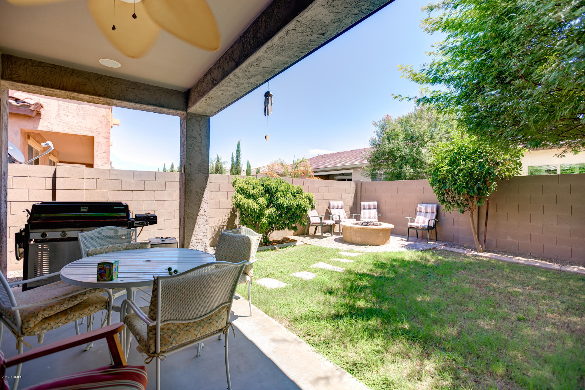 3515 East Ivanhoe Street Gilbert, AZ 85295 - Photo 39 of 49 a view of a patio with table and chairs and potted plants