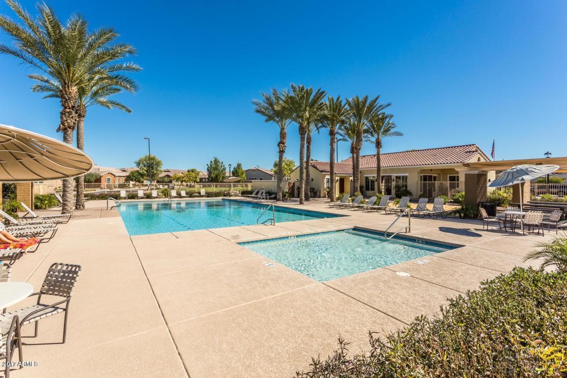 3515 East Ivanhoe Street Gilbert, AZ 85295 - Photo 46 of 49 a swimming pool with outdoor seating and yard