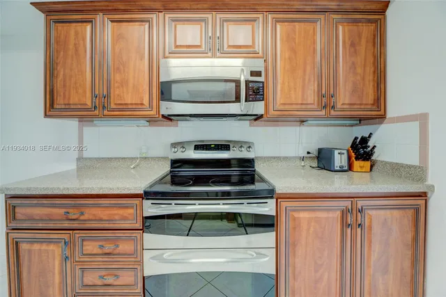 a bedroom with two beds and a window