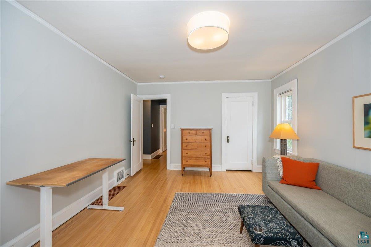 5401 Otsego Street Duluth, MN 55804 - Photo 13 of 36 Hardwood flooring extending throughout the space