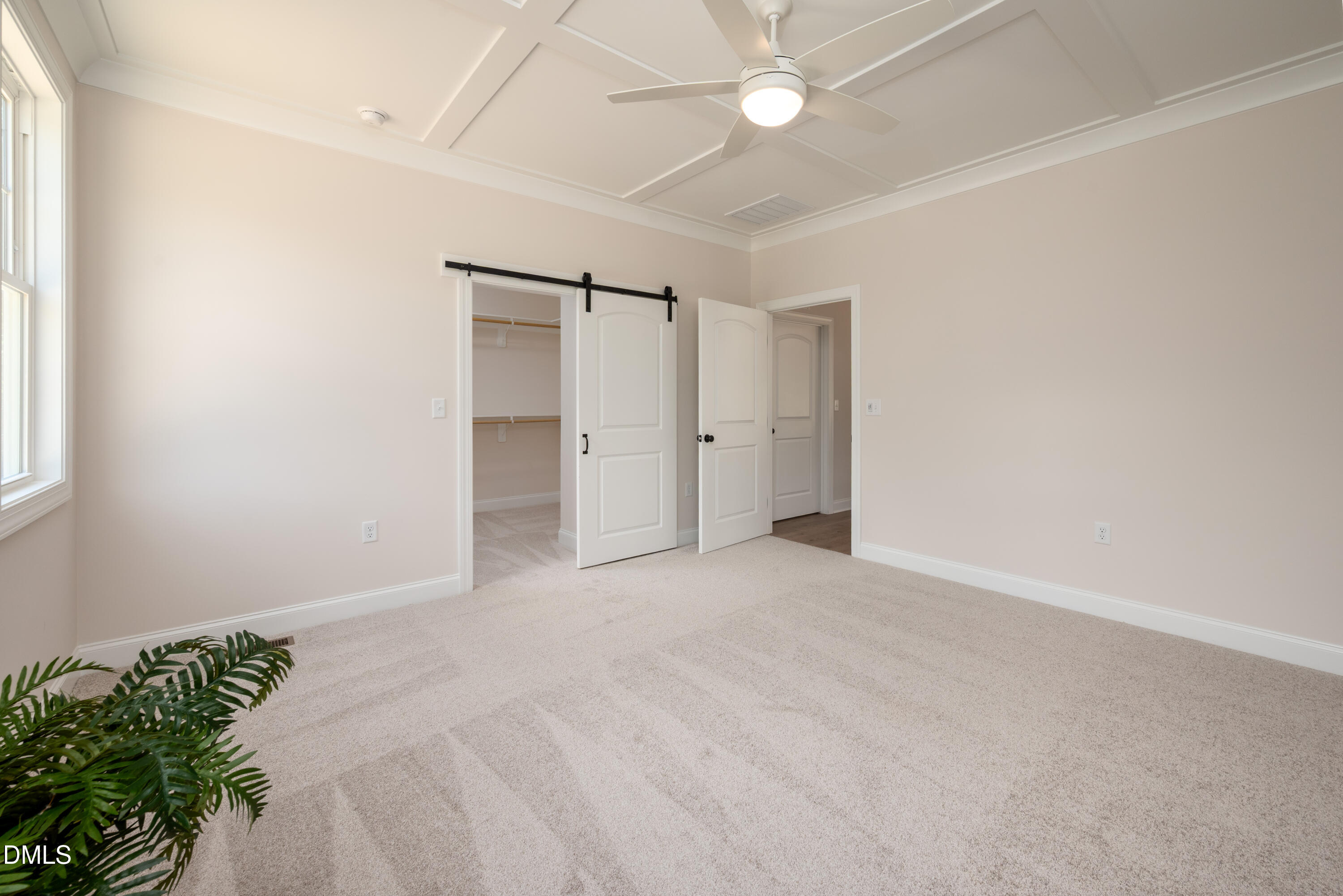 2275 Peachtree Hills Road Spring Hope, NC 27882 - Photo 22 of 43 an empty room with a ceiling fan and a window