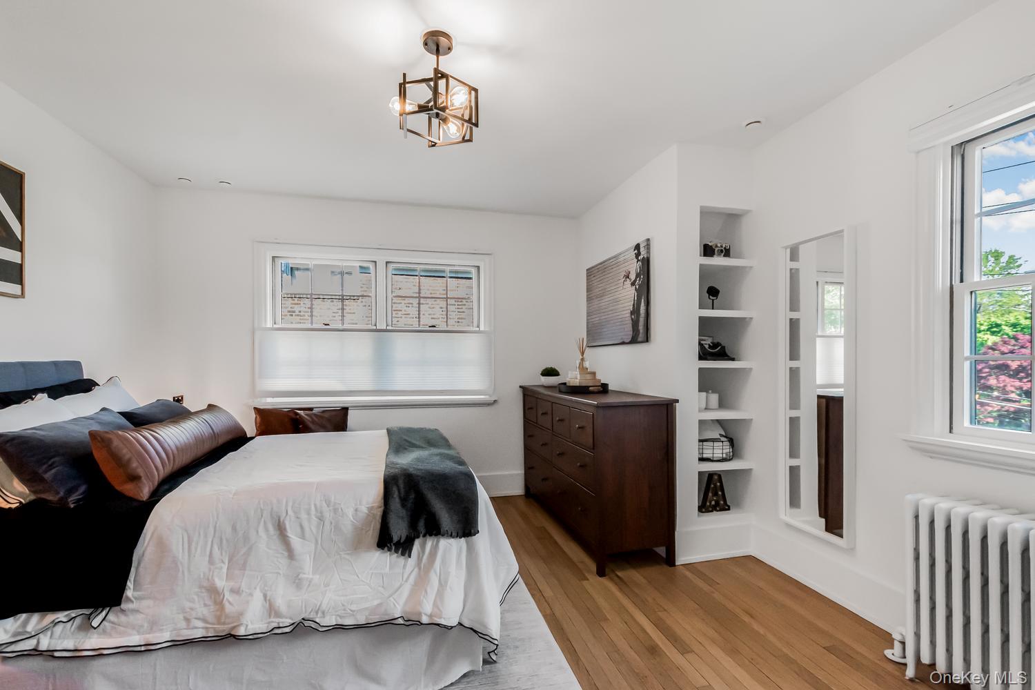 209 Storer Avenue New Rochelle, NY 10801 - Photo 20 of 39 a bedroom with furniture and a window