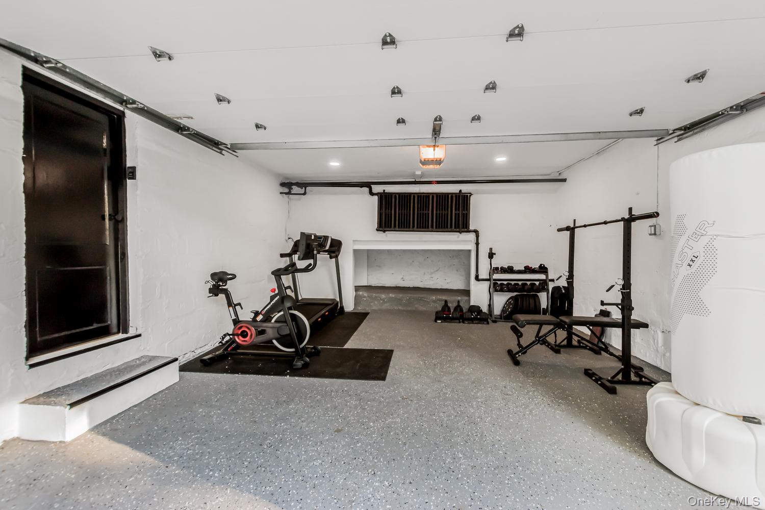 209 Storer Avenue New Rochelle, NY 10801 - Photo 25 of 39 a view of a room with gym equipment