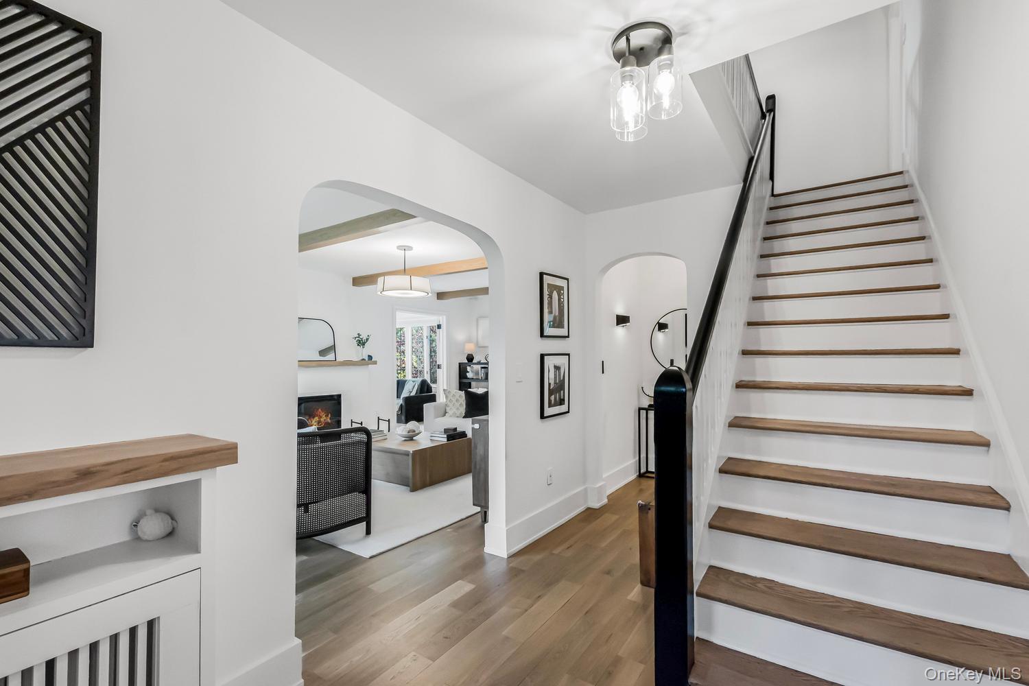 209 Storer Avenue New Rochelle, NY 10801 - Photo 3 of 39 a view of entryway and hall with wooden floor