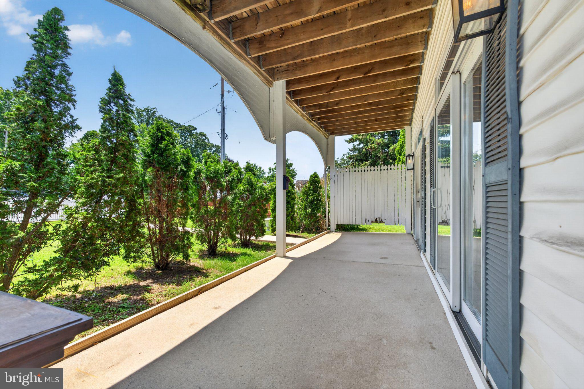 2858 Lodge Farm Road Baltimore, MD 21219 - Photo 23 of 49 Inviting outdoor space with lush greenery.