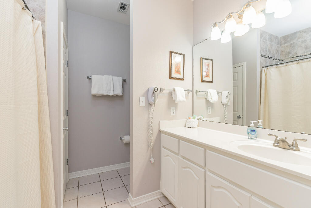 159 Gulfside Way Miramar Beach, FL 32550 - Photo 11 of 17 a bathroom with a double vanity sink mirror and