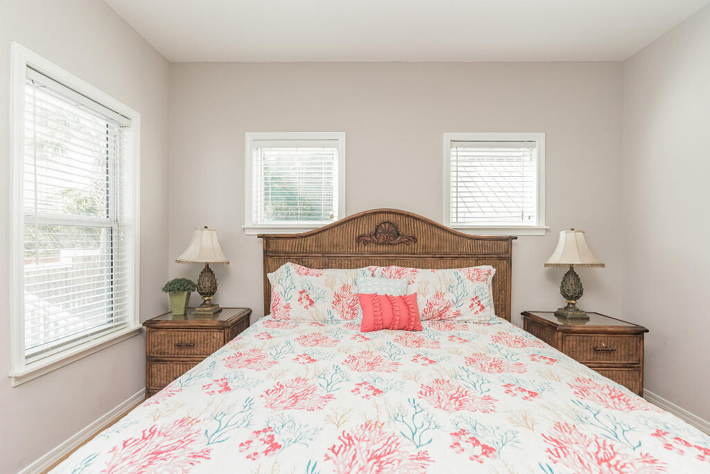 159 Gulfside Way Miramar Beach, FL 32550 - Photo 12 of 17 a bedroom with a bed and a window