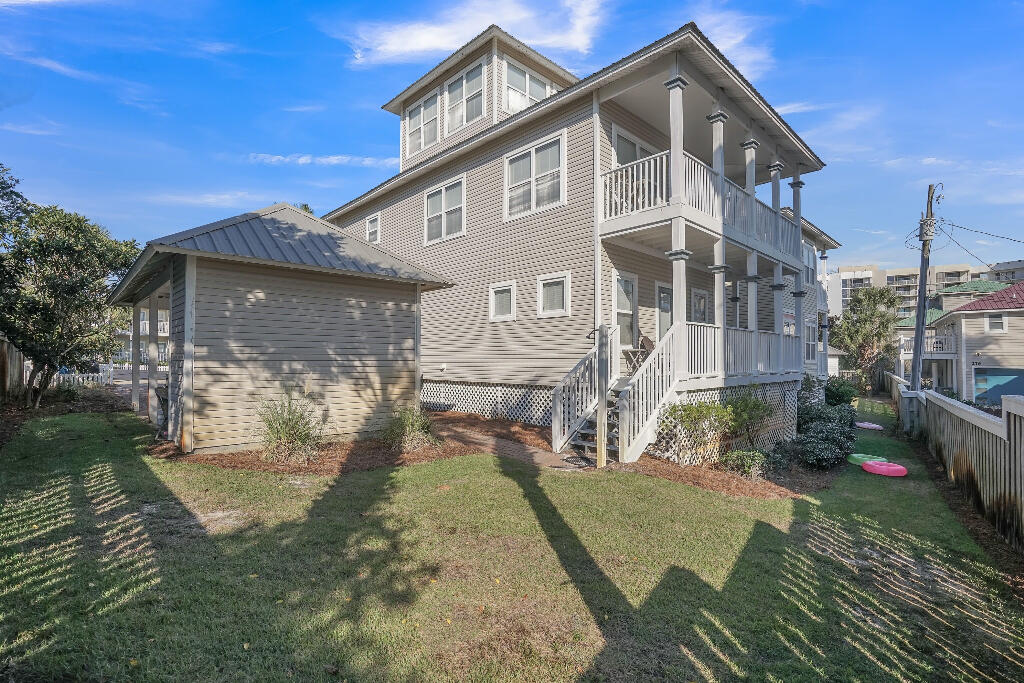 159 Gulfside Way Miramar Beach, FL 32550 - Photo 2 of 17 a front view of a house with a yard