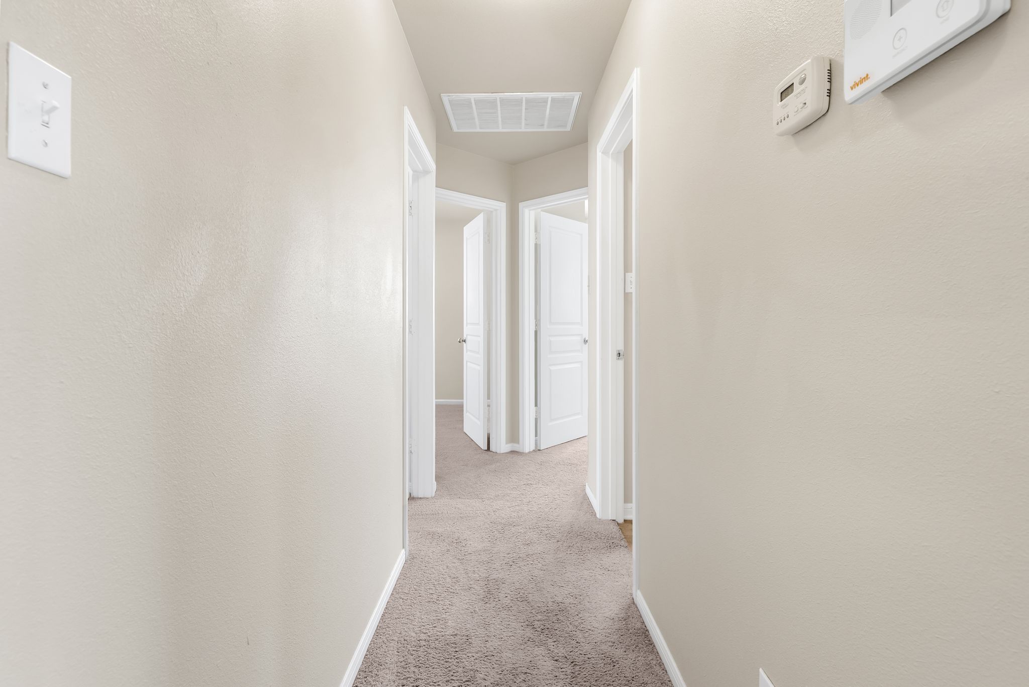 7719 Fieldstone Drive Temple, TX 76502 - Photo 5 of 37 Hall with light carpet and baseboards