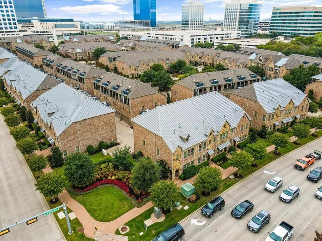 an aerial view of a house with outdoor space