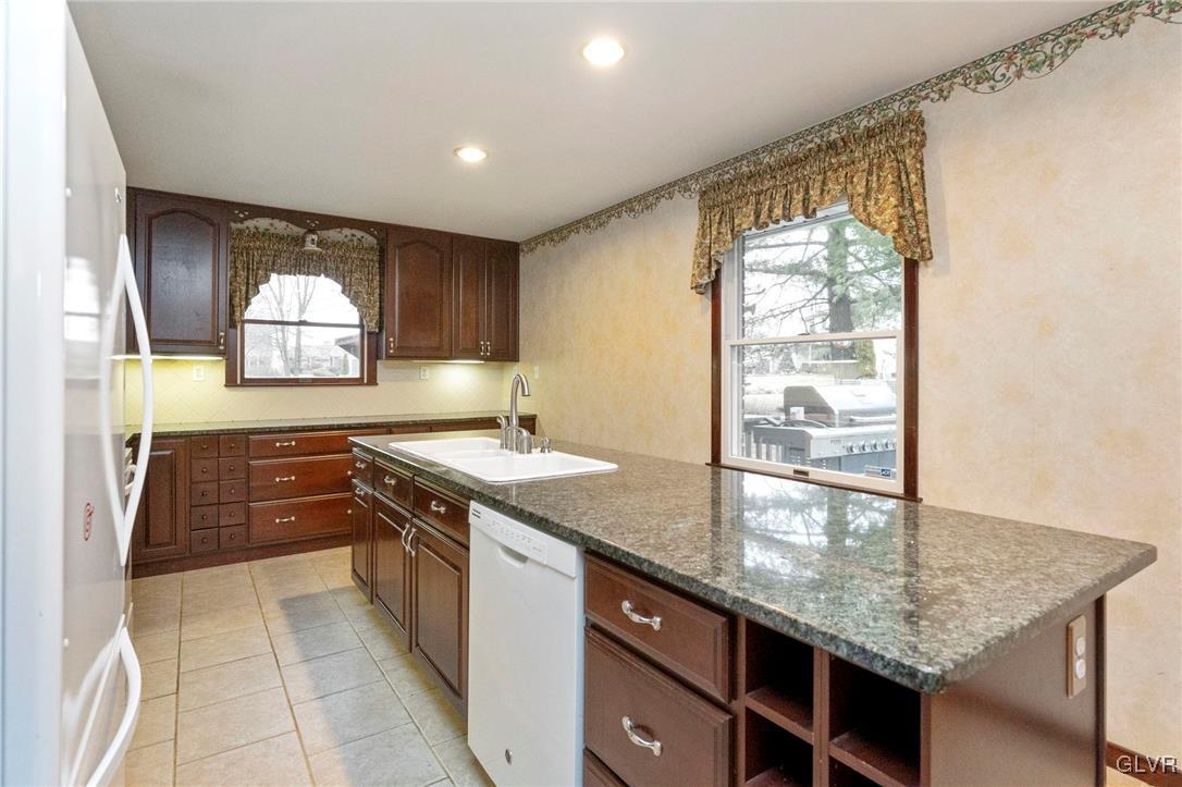 7058 Limerick Square Bethlehem, PA 18017 - Photo 14 of 30 a kitchen with a sink and a window