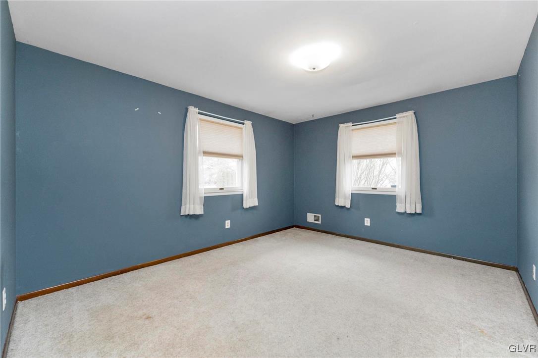 7058 Limerick Square Bethlehem, PA 18017 - Photo 18 of 30 an empty room with windows