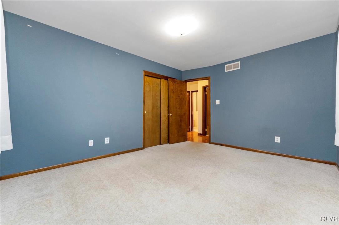 7058 Limerick Square Bethlehem, PA 18017 - Photo 19 of 30 an empty room with a window and doors