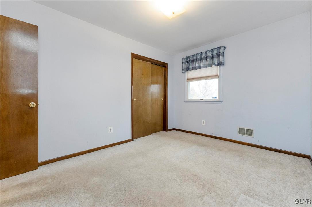 7058 Limerick Square Bethlehem, PA 18017 - Photo 20 of 30 an empty room with windows and closet