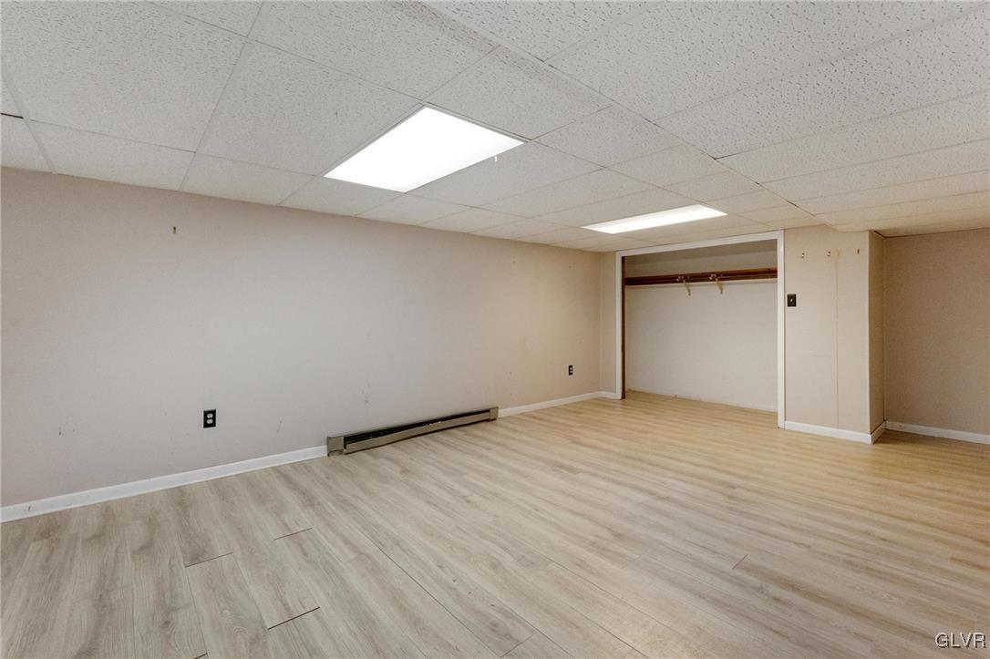 7058 Limerick Square Bethlehem, PA 18017 - Photo 25 of 30 wooden floor in an empty room with a window