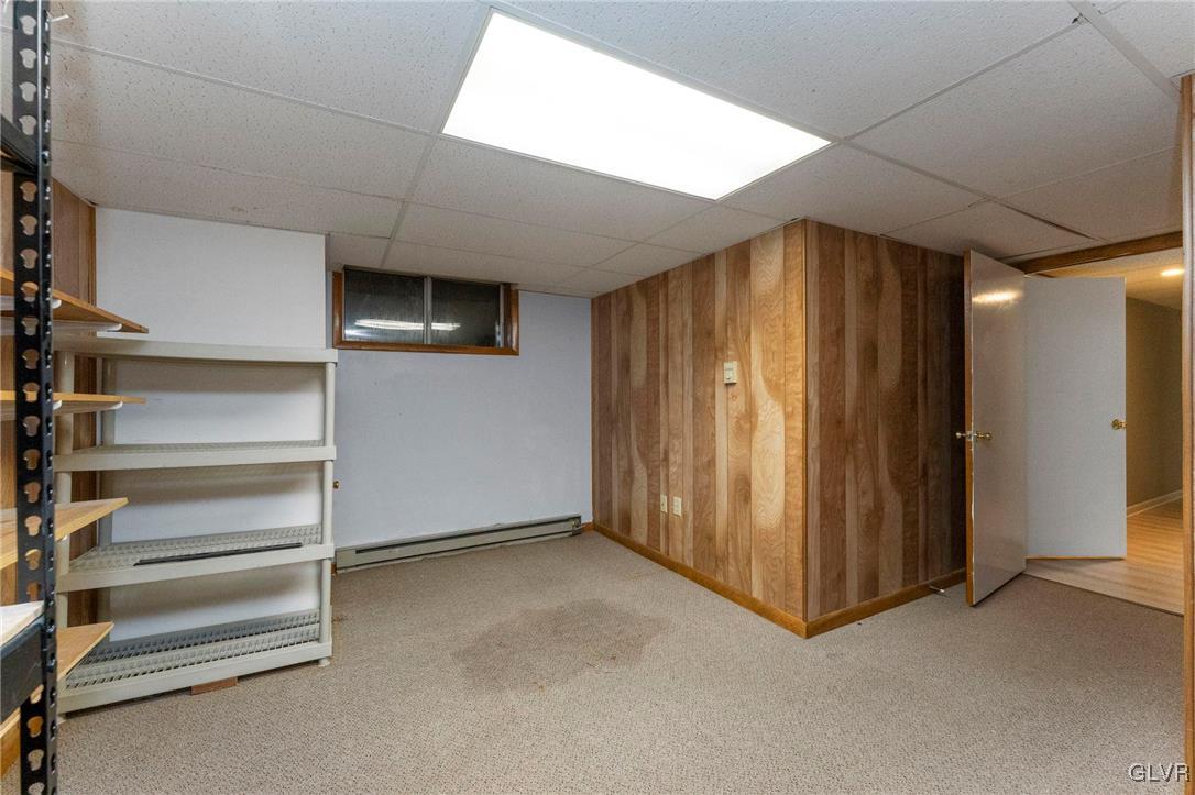 7058 Limerick Square Bethlehem, PA 18017 - Photo 26 of 30 a view of an empty room with a fireplace