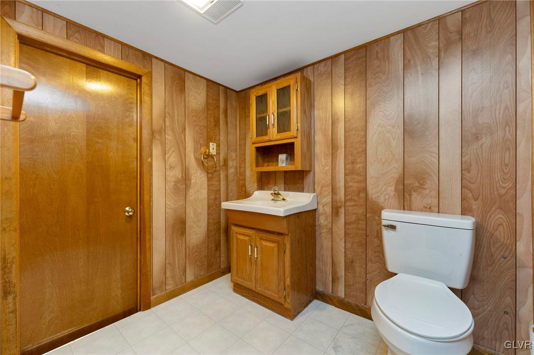 7058 Limerick Square Bethlehem, PA 18017 - Photo 27 of 30 a bathroom with a toilet a sink and shower