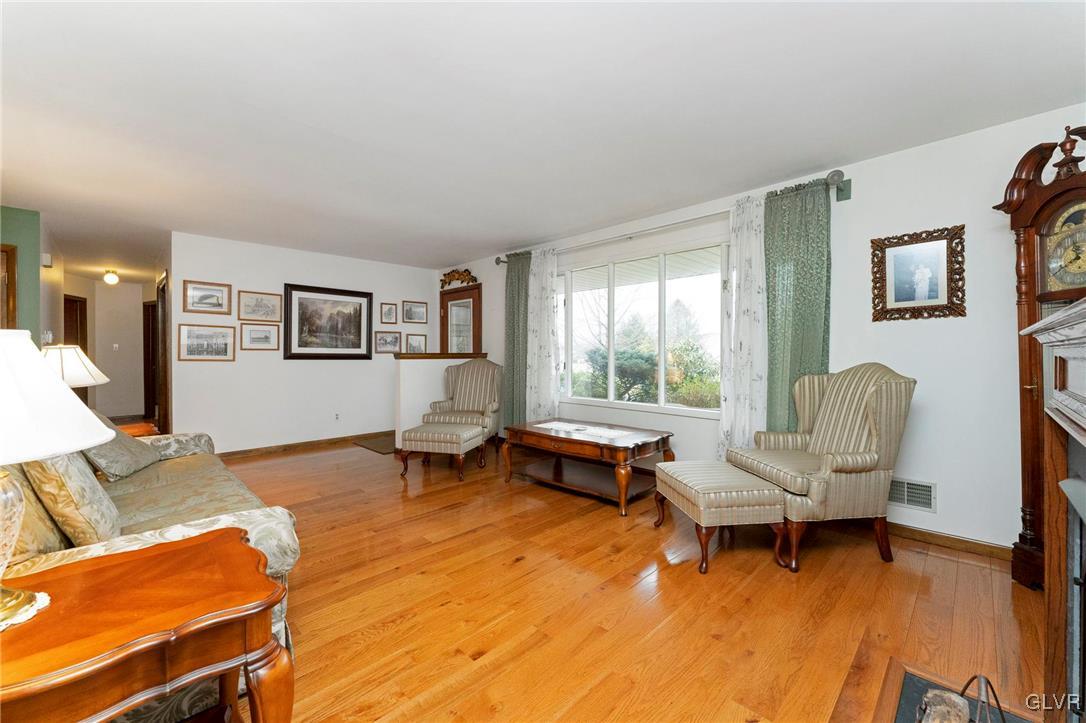 7058 Limerick Square Bethlehem, PA 18017 - Photo 5 of 30 a living room with furniture and a wooden floor