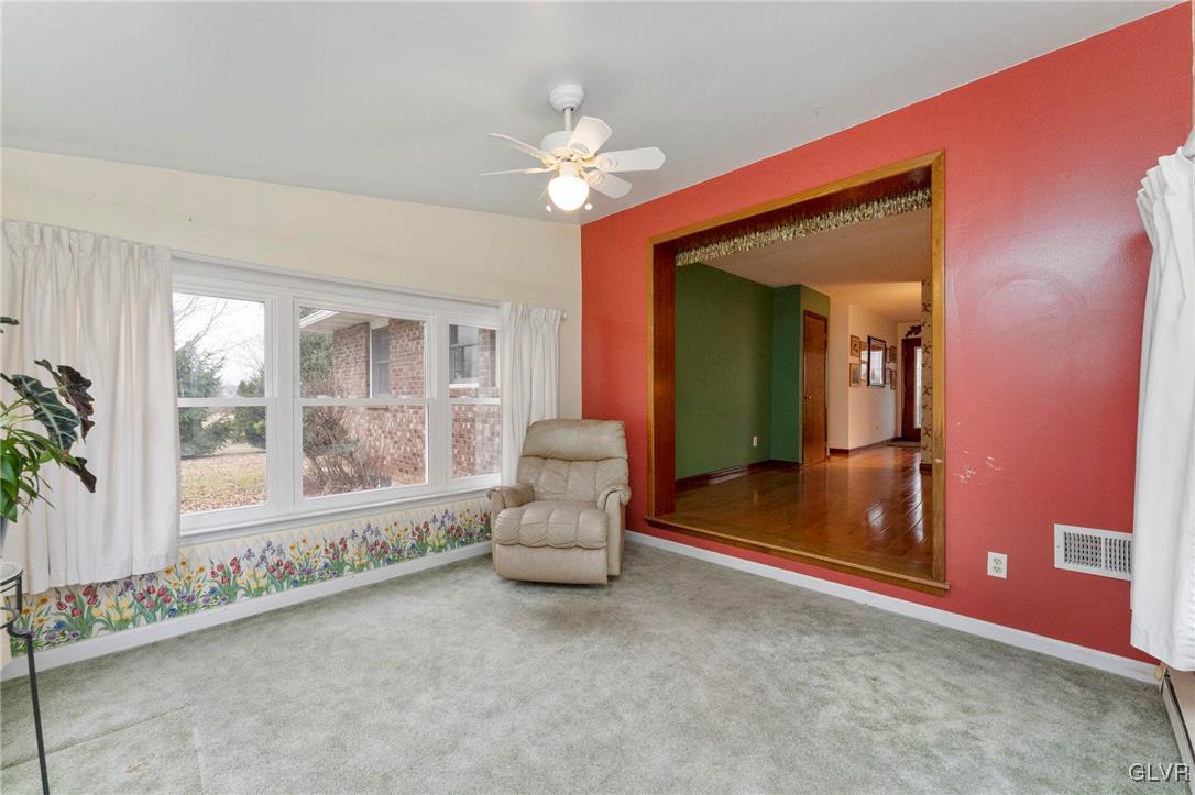 7058 Limerick Square Bethlehem, PA 18017 - Photo 10 of 30 a living room with furniture and a large window