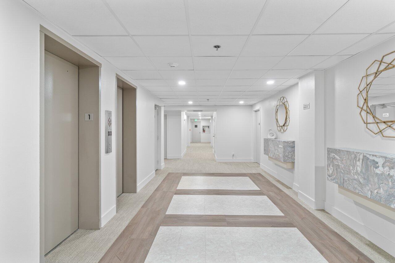 4511 South Ocean Boulevard, Unit 106 Highland Beach, FL 33487 - Photo 2 of 37 a view of an entryway