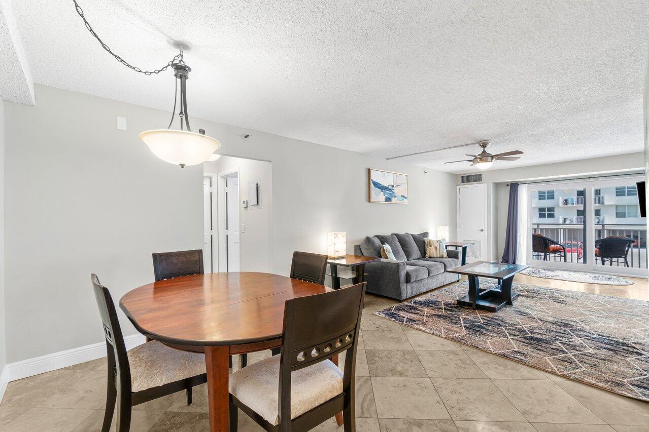 4511 South Ocean Boulevard, Unit 106 Highland Beach, FL 33487 - Photo 4 of 37 a view of a dining room with furniture