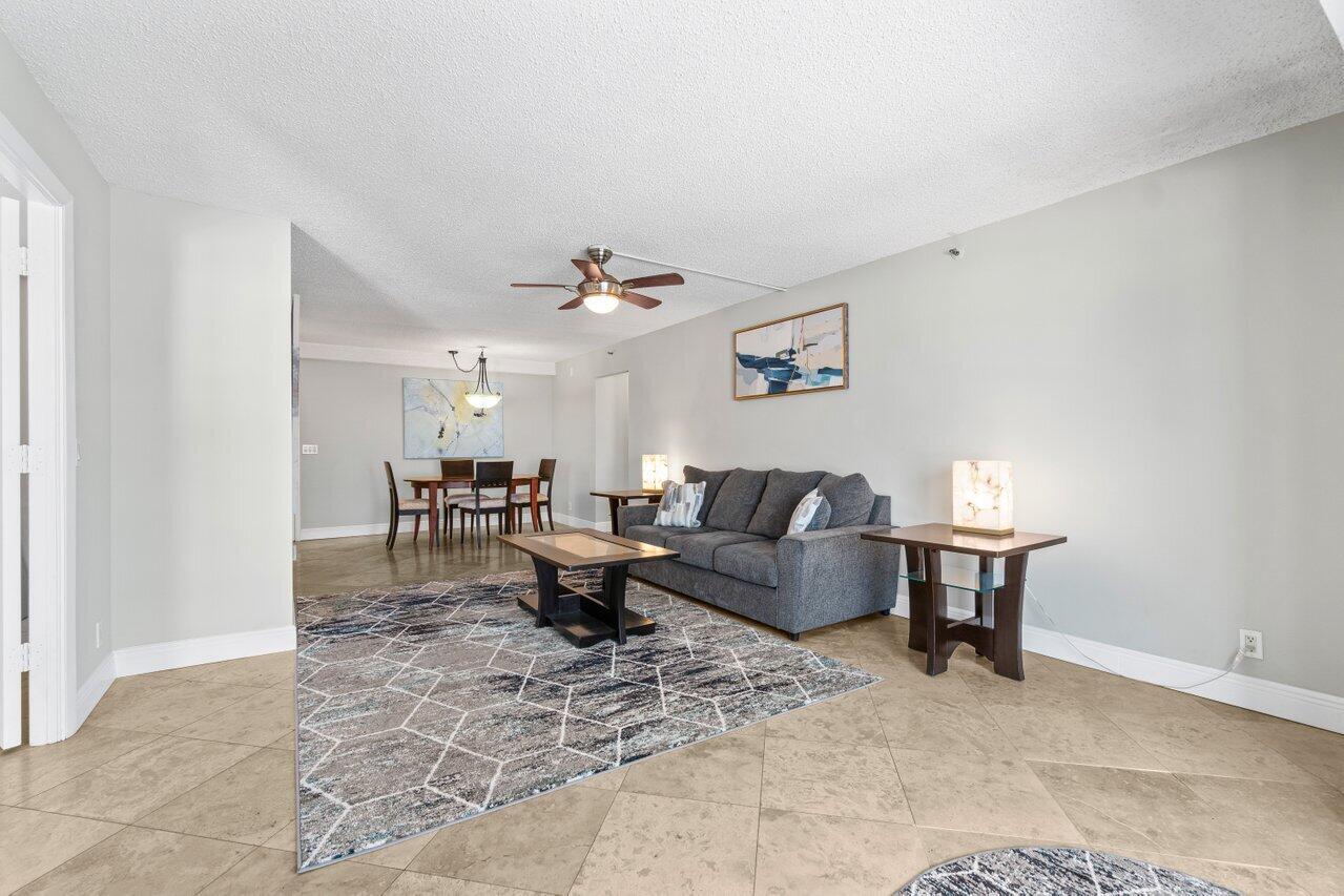 4511 South Ocean Boulevard, Unit 106 Highland Beach, FL 33487 - Photo 7 of 37 a living room with furniture