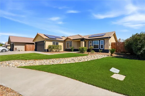 a front view of house with yard