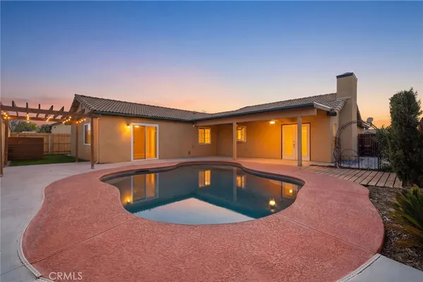 a view of outdoor space and swimming pool