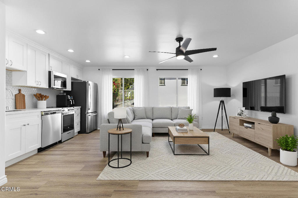 3308 Primavera Street Pasadena, CA 91107 - Photo 11 of 26 a living room with furniture and a flat screen tv