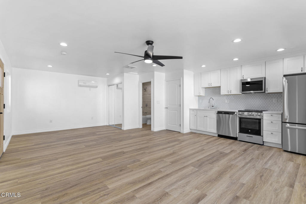 3308 Primavera Street Pasadena, CA 91107 - Photo 16 of 26 a view of a kitchen with a sink and a stove top oven