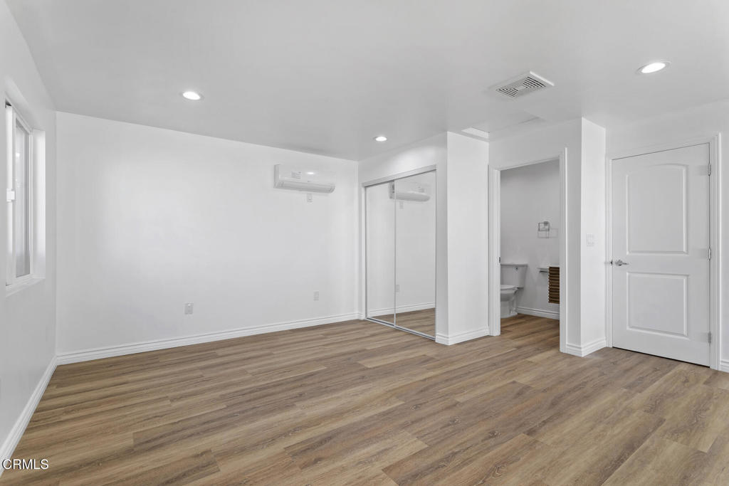 3308 Primavera Street Pasadena, CA 91107 - Photo 20 of 26 a view of an empty room with wooden floor