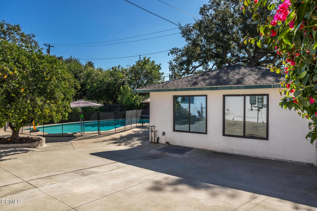 3308 Primavera Street Pasadena, CA 91107 - Photo 2 of 26 a view of a house with backyard and sitting area