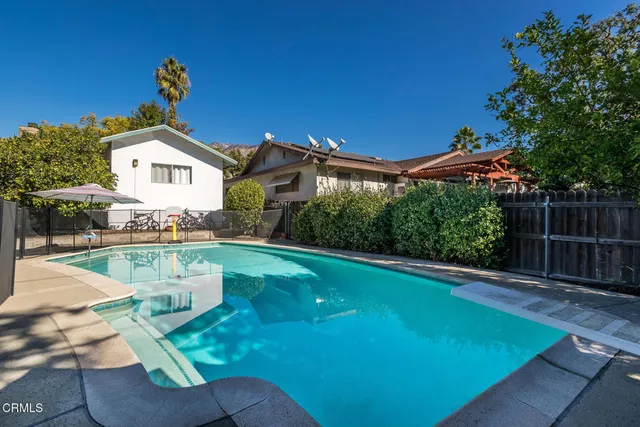 a view of a house with a swimming pool