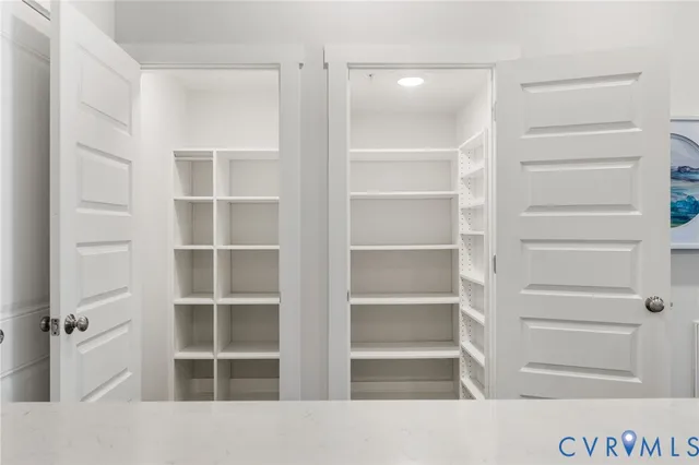 a view of an empty walk in closet