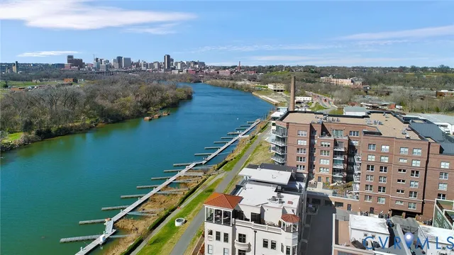 a view of a city with a lake