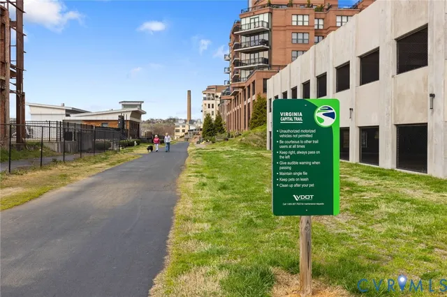 a view of a street with a building in the background