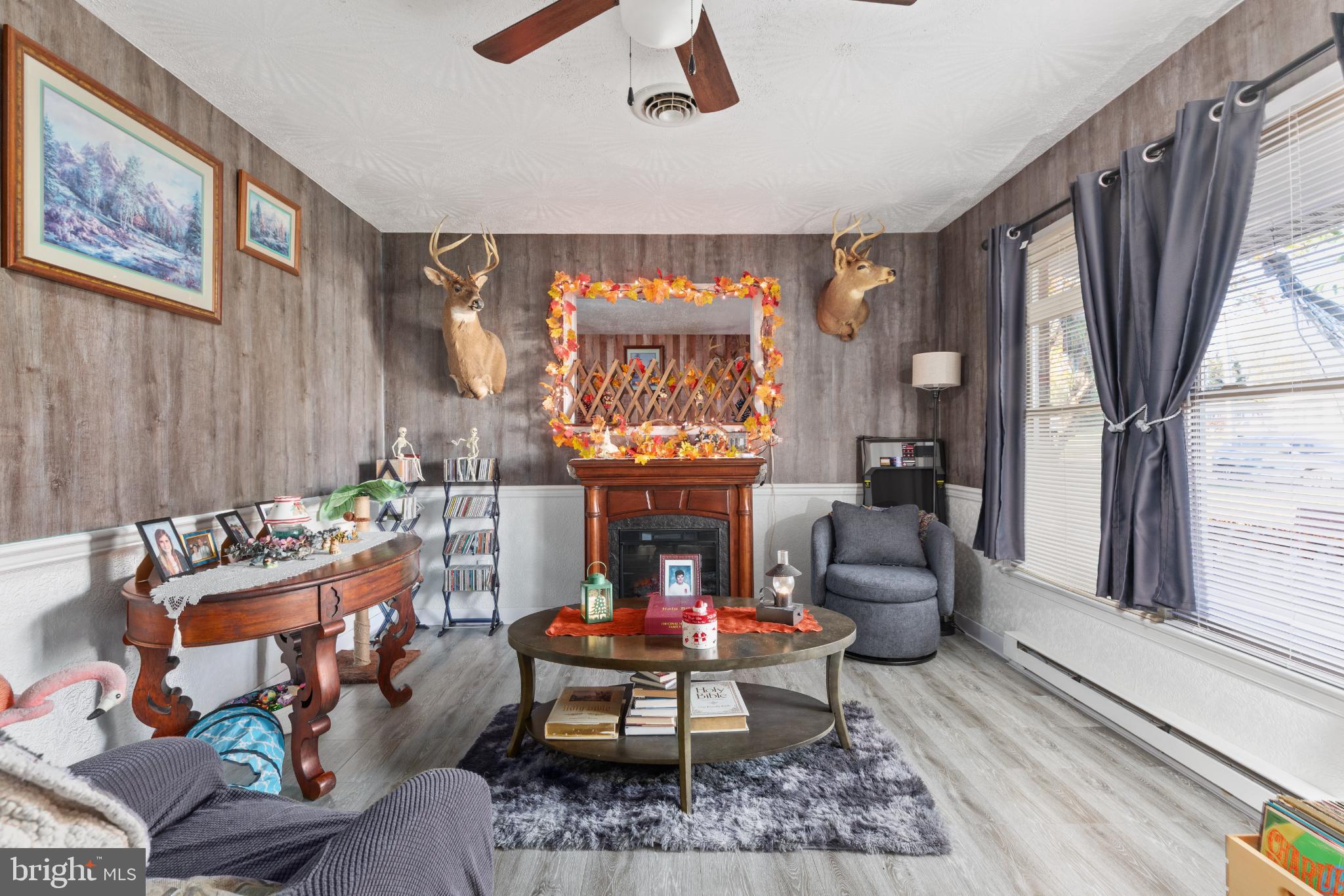 63 Declaration Drive Inwood, WV 25428 - Photo 4 of 25 a living room with furniture a rug and a large window