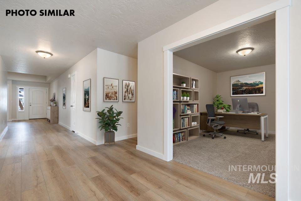 1645 Haystack Emmett, ID 83617 - Photo 3 of 33 Entryway featuring wood-finish flooring, white trim, and light wall paint