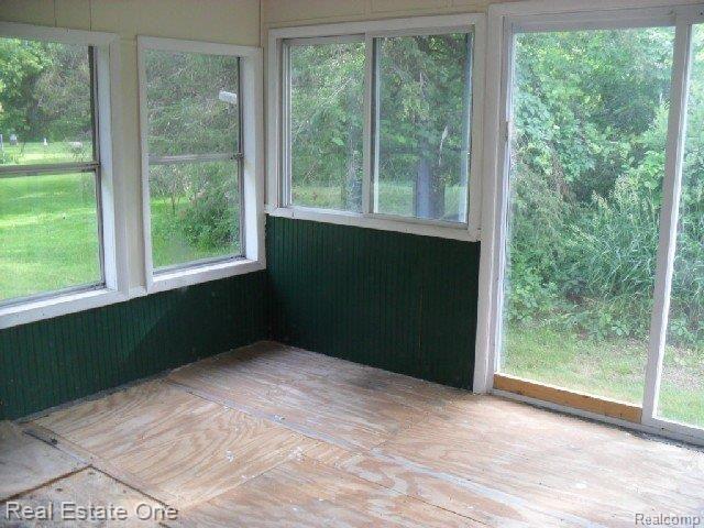 3421 Brewer Road Howell, MI 48855 - Photo 15 of 25 3421 Brewer Rd.-Encl Porch(a).jp
