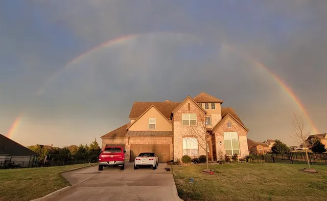 a view of car parked in front of house